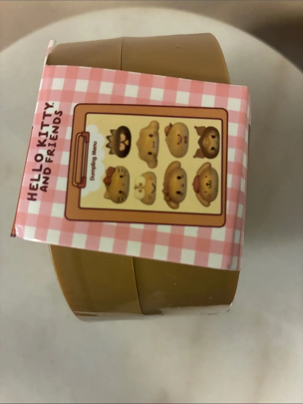 Hello Kitty Mystery Squishy Dumpling - Pink and Cream Packaging